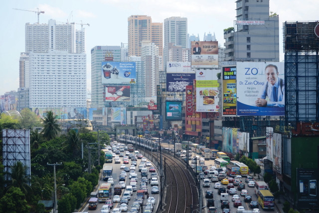  NEWSFLASH, CNN: The most densely populated city is faraway Manila.  (credit: Dondi Tawatao/Getty Images)