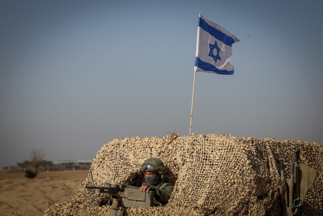  Israeli soldiers patrol near the Israeli-Gaza border, southern Israel, November 23, 2023 (credit: Chaim Goldberg/Flash90)