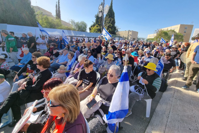  Kabalat Shabbat ceremony in front of the Knesset, where the families of the victims and hostages are camped.  (credit: Courtesy)