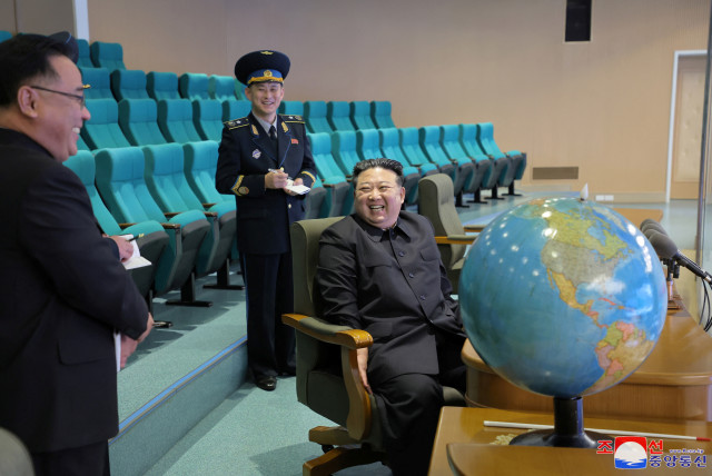  North Korea's leader Kim Jong-un visits the Pyongyang General Control Centre of the National Aerospace Technology Administration to inspect operational readiness of the reconnaissance satellites and view aerospace photographs, in this picture released by the Korean Central News Agency, November 2 (credit: KCNA VIA REUTERS)