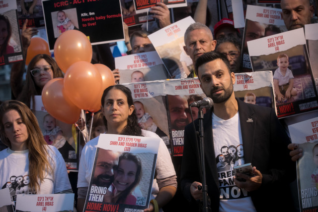  Yoseph Haddad speaks at a press conference calling for the release of 10 month old Kfir, 4 year old Ariel, and their parents Shiri and Yarden Bibas. at  ''Hostage Square'' in Tel Aviv, November 28, 2023.  (credit: MIRIAM ALSTER/FLASH90)