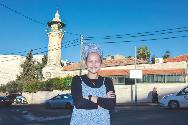  MORIAH COHEN outside her Sheikh Jarrah home this week: It’s not fun to walk in the street near my house, knowing that the woman who stabbed me in front of my children is back home, perhaps peeking at me from her house.  (credit: MARC ISRAEL SELLEM/THE JERUSALEM POST)