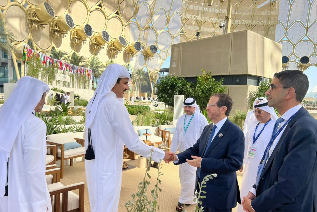  President Isaac Herzog meets with Emir of Qatar Tamim bin Hamad Al Thani at COP28 (credit: Courtesy)