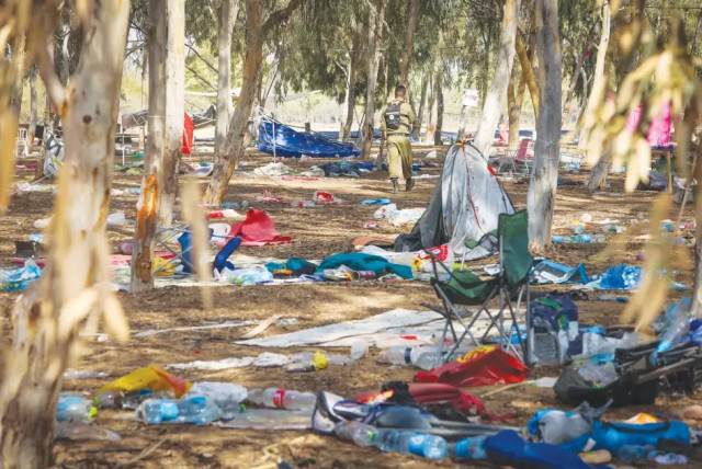 Terrorism can come in several forms, including sexual assault and rape motivated by nationalism. Pictured: The scene of Hamas's October 7 massacre at the Supernova music festival. (credit: YOSSI ZAMIR/FLASH90)