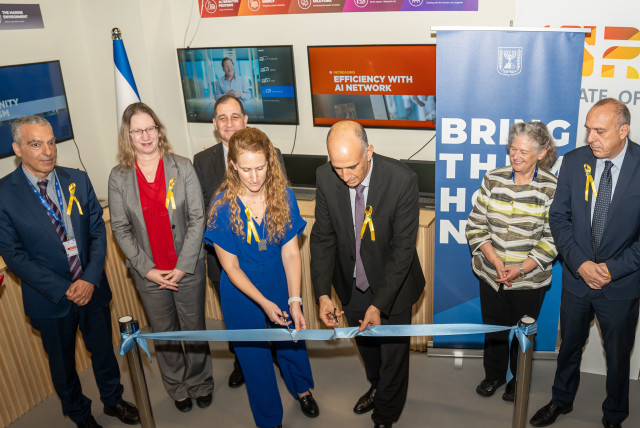  Israel opened a small pavilion on Monday with short ribbon-cutting and mezuzah placement ceremonies. (credit: BRADLEY D'COUTHO)