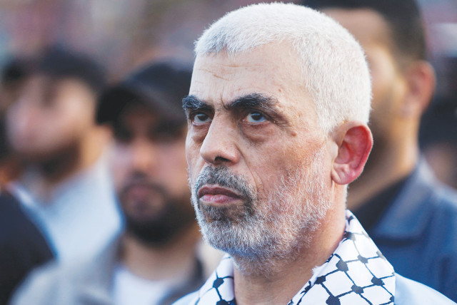  Hamas terrorist leader Yahya Sinwar attends a rally in Gaza City last year. a Hamas document published in 2017 does not replace its charter; it only offers a more pragmatic modus operandi to destroy Israel. (credit: MOHAMMED SALEM/REUTERS)