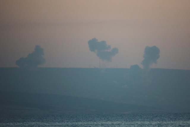  Smoke rises on the Lebanese side near the border with Israel, amid ongoing cross-border hostilities between Hezbollah and Israeli forces, as seen from Tyre, southern Lebanon December 2, 2023 (credit: AZIZ TAHER/REUTERS)