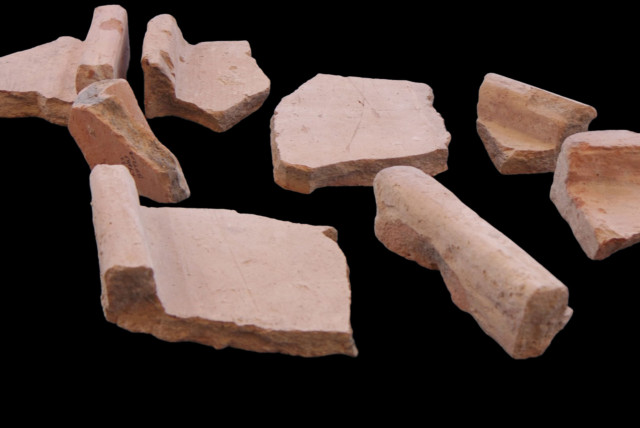  Rooftile fragments discovered at the Giv‘ati Parking Lot Excavation. (credit: EMIL ALADJEM/IAA)