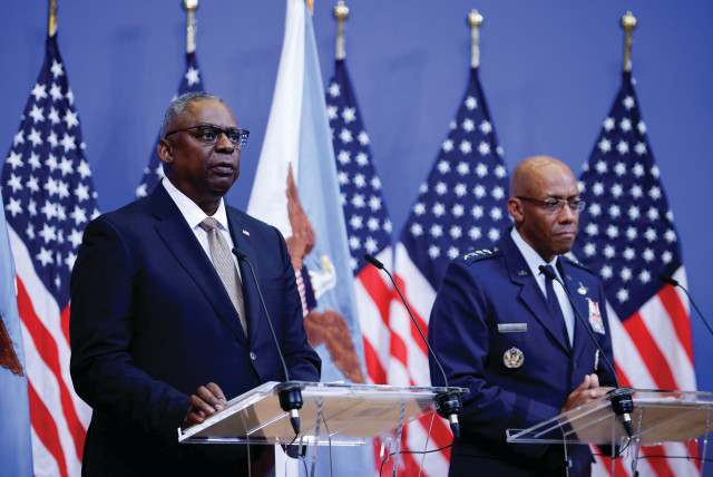 US Defense Secretary Lloyd Austin and Chairman of the Joint Chiefs of Staff Gen. Charles Q. Brown hold a news conference during a meeting of NATO defense ministers in Brussels, in October. (credit: JOHANNA GERON/REUTERS)