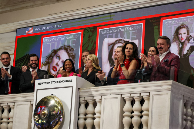  Jessica Sibley, CEO of TIME rings the opening bell to celebrate the reveal of the 2023 TIME Person of the Year, Taylor Swift, at the New York Stock Exchange (NYSE) in New York City, U.S., December 6, 2023. (credit: REUTERS/BRENDAN MCDERMID)
