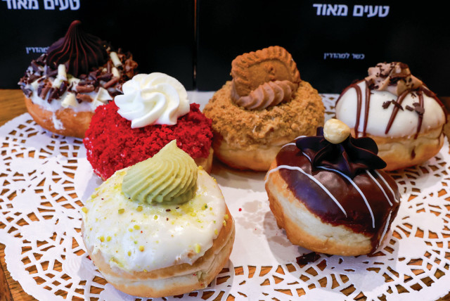  Hanukkah doughnuts at English Cake. (credit: MARC ISRAEL SELLEM)