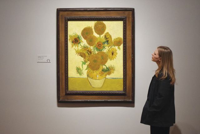  PONDERING VINCENT VAN GOGH’S ‘Sunflowers’ at the Tate Britain in London. (credit: Stuart C. Wilson/Getty Images)