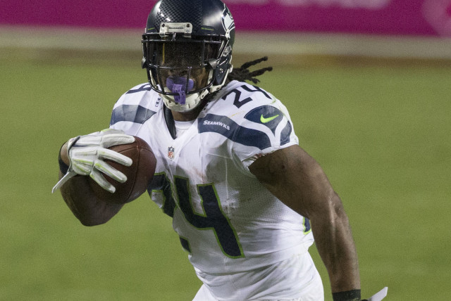  Marshawl Lynch playing with the Seattle Seahawks in 2014 against the Washington Redskins. (credit: Wikimedia Commons)