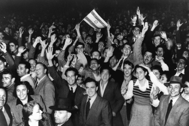  JEWS CELEBRATE in Tel Aviv, moments after the United Nattions voted on November 29, 1947, to partition Palestine, paving the way for the establishment of the State of Israel. (credit: REUTERS)