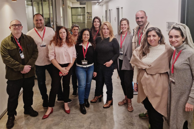  Eran Yomtovyan (second from left), the director of the Schreiber LevTech Entrepreneurship Center at JCT, poses with heads of the other various initiatives and educational institutions behind the hackathon at the Margalit Start-Up City in Jerusalem (credit: JCT)