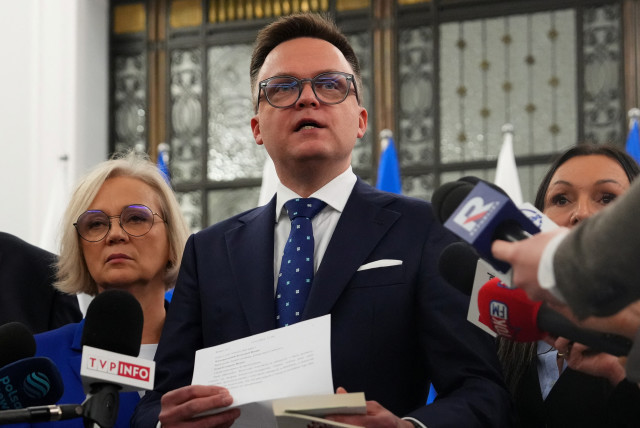 Speaker of Polish Parliament, Szymon Holownia, speaks to the media, in Warsaw. (credit: REUTERS)