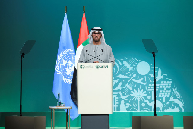  United Arab Emirates Minister of Industry and Advanced Technology and COP28 President Sultan Ahmed Al Jaber addresses the plenary, after a draft of a negotiation deal was released, at the United Nations Climate Change Conference COP28 in Dubai, United Arab Emirates, December 13, 2023. (credit: REUTERS/AMR ALFIKY)