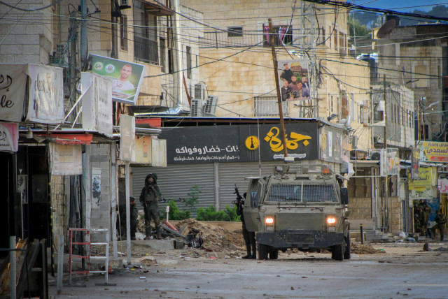  A counter terrorism raid by the Israeli army, in the West Bank city of Jenin, December 13, 2023.  (credit:  Nasser Ishtayeh/Flash90)