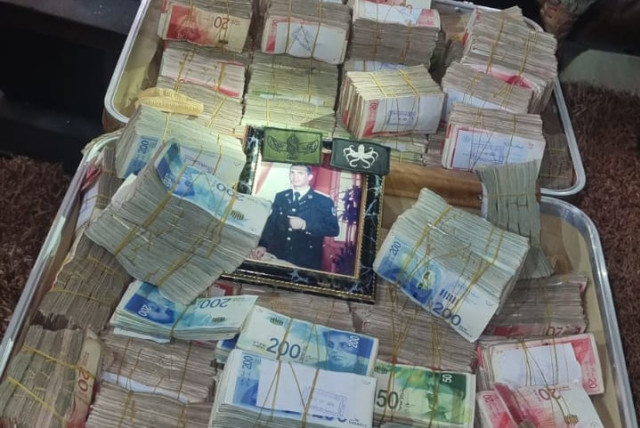  Suitcases of cash found in the home of a senior Hamas member in Gaza. December 18, 2023 (credit: IDF SPOKESPERSON'S UNIT)