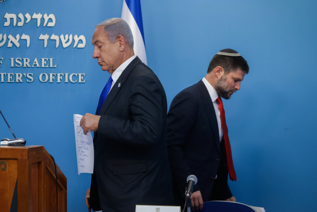 Prime Minister Benjamin Netanyahu gives a press conference with Finance Minister Bezalel Smotrich at the Prime Minister's Office in Jerusalem. January 11, 2023. (credit: OLIVIER FITOUSSI/FLASH90)