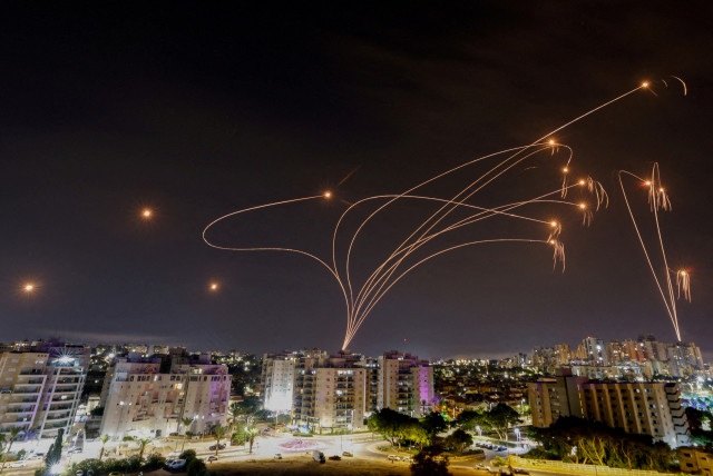  Israel's Iron Dome anti-missile system intercepts rockets launched from the Gaza Strip, as seen from the city of Ashkelon, Israel, October 9, 2023 (credit: REUTERS/AMIR COHEN)