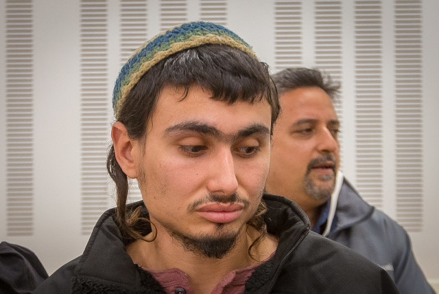  IDF reservist Sgt. (res.) Aviad Frija, suspected of shooting Israeli civilian Yuval Doron to death at the scene of the attack in Jerusalem a few weeks ago, arrives to a court hearing at the Beit Lid Military Court on December 26, 2023. (credit: FLASH90)