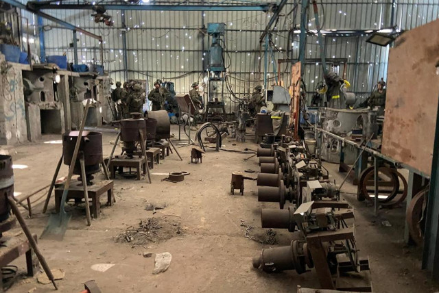  IDF troops inside the weapons facility in al-Boreij, Gaza, January 8, 2024 (credit: IDF SPOKESPERSON'S UNIT)