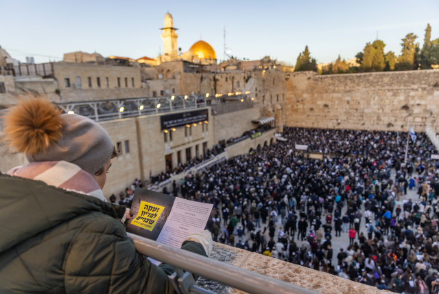  Jews pray for the army success in the war against Hamas, for the return of the Israeli hostages held by Hamas terrorists in Gaza and in memory of the people murdered in the October 7 massacre, at the Western Wall, Judaism's holiest prayer site in the Old City of Jerusalem, January 10, 2024.  (credit: Chaim Goldberg/Flash90)
