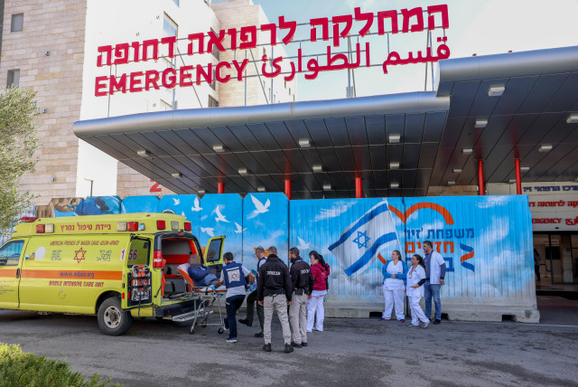 A wounded person from the scene of the anti-tank missile in Kfar Yuval, is brought to the Ziv Medical center in Tzfat, northern Israel, January 14, 2024 (credit: FLASH90/CHAIM GOLDBERG)
