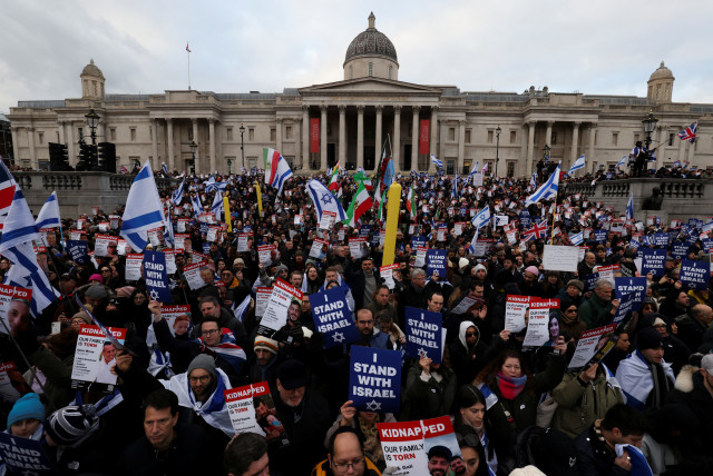  People attend the 'We Stand With Israel' rally to express solidarity with the country on the 100 day anniversary since the October 7 attack by Palestinian Islamist group Hamas, amid the ongoing conflict between Israel and Hamas, in Trafalgar Square in London, Britain, January 14, 2024. (credit: REUTERS/Belinda Jiao)