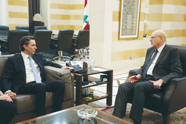  US SPECIAL Envoy Amos Hochstein (left) meets with Lebanon’s caretaker Prime Minister Najib Mikati in Beirut, in November. (credit: MOHAMED AZAKIR/REUTERS)