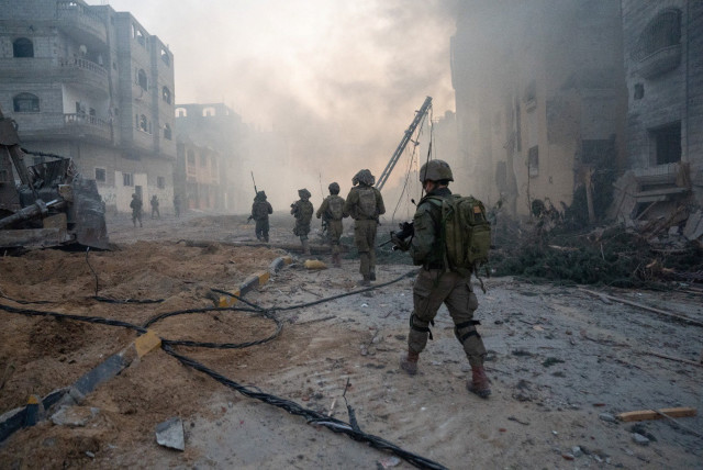  Israeli soldiers operate in the Gaza Strip amid the ongoing conflict between Israel and Hamas, January 21, 2024 (credit: IDF SPOKESPERSON'S UNIT)
