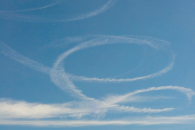  Clouds and sky trails in the air in southern Israel. (credit: MAX RICHARDSON)
