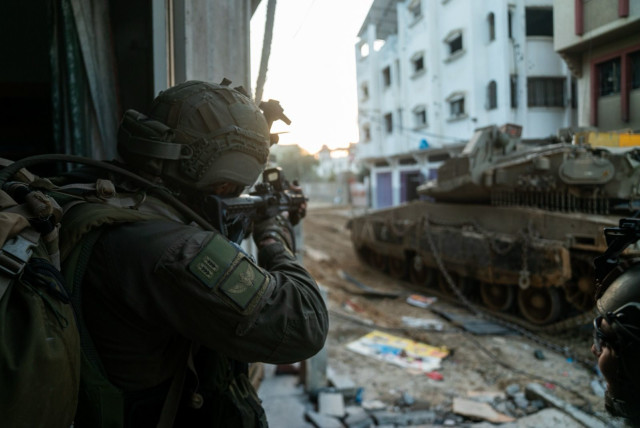  IDF Commando Brigade troops operate in Khan Yunis, Gaza. January 27, 2024. (credit: IDF SPOKESPERSON'S UNIT)