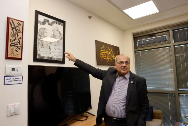 'The interview took place in Tibi's spacious office in the Knesset – the perks of being a member of Knesset since 1999. The office is decorated with verses from the Koran and the poetry of Palestinian national poet Mahmoud Darwish.' (credit: MARC ISRAEL SELLEM)
