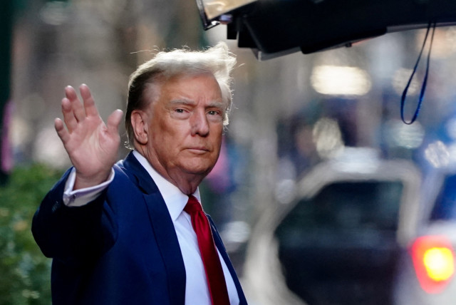  Former U.S. President Donald Trump gestures as he walks outside Trump Tower to attend a court hearing on charges of falsifying business records to cover up a hush money payment to a porn star before the 2016 election, in New York City, U.S., February 15, 2024.  (credit: REUTERS/BING GUAN)