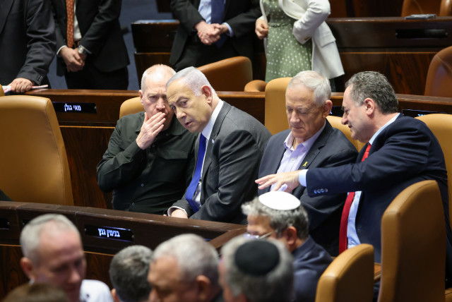 Yoav Gallant, Benjamin Netanyahu, Benny Gantz and Israel Katz in the Knesset plenum on February 21, 2024 (credit: NOAM MOSKOVICH/KNESSET)
