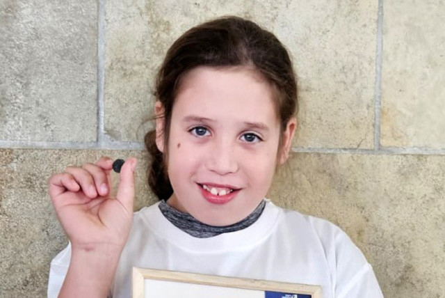  Nati Toyikar, 11, who found the 2,000 year old coin.  (credit: Israel Antiquities Authority)