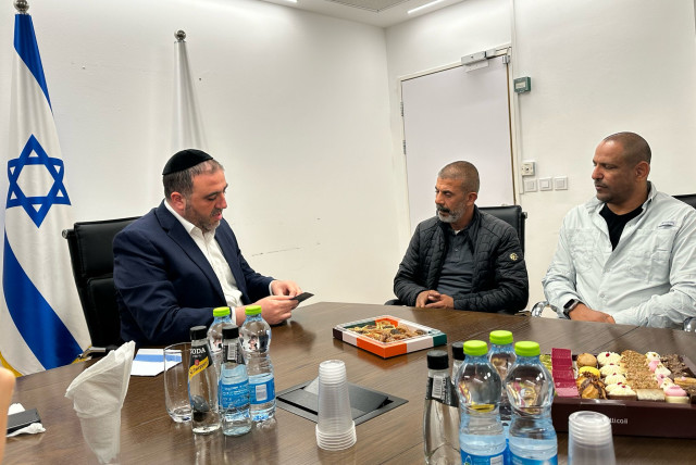  Interior Minister Moshe Arbel granting permanent resident status to Hamid Abu Arar for his life-saving actions on October 7, February 21, 2024. (credit: Courtesy)