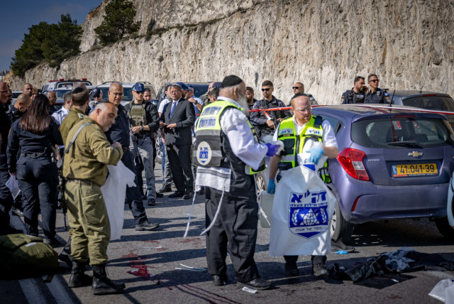 The scene of a terror shooting attack on road numer 1 near Maaleh Adumim, in the West Bank, February 22, 2024. Photo by Chaim Goldberg/Flash90 (credit: Chaim Goldberg/Flash90)
