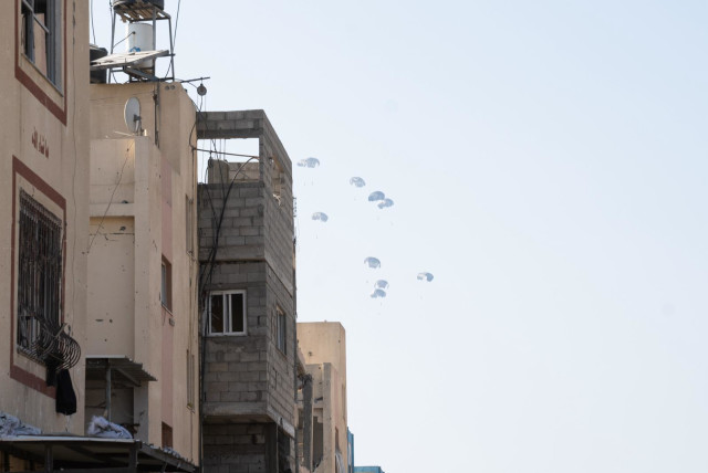  Humanitarian aid is seen airdropped to residents of southern Gaza by a joint-coordinated effort, February 28, 2024. (credit: IDF SPOKESPERSON UNIT)