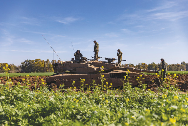  An IDF tank is seen near the Gaza border. (credit: FLASH90)