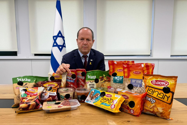  Economy Minister Nir Barkat announcing the new Black Sticker law to label products which raised their prices during the war, February 29, 2024. (credit: GOVERNMENT PRESS OFFICE)