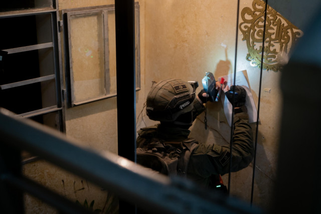  IDF troops map the house of the terrorist who carried out the deadly Eli gas station shooting, February 29, 2024 (credit: IDF SPOKESPERSON'S UNIT)