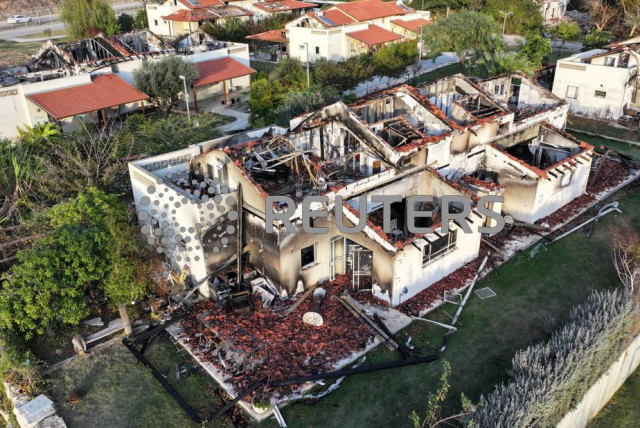  Damaged houses are seen, following the deadly October 7 attack by gunmen from Palestinian militant group Hamas from the Gaza Strip, in Kibbutz Beeri in southern Israel, November 28, 2023.  (credit: ILAN ROSENBERG/REUTERS)