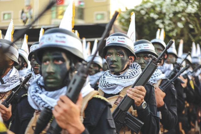  PALESTINIAN ISLAMIC Jihad supporters participate in an anti-Israel rally marking the 36th anniversary of the movement’s foundation, in Gaza City on the day before the October 7 attack on Israel.  (credit: ATIA MOHAMMED/FLASH90)