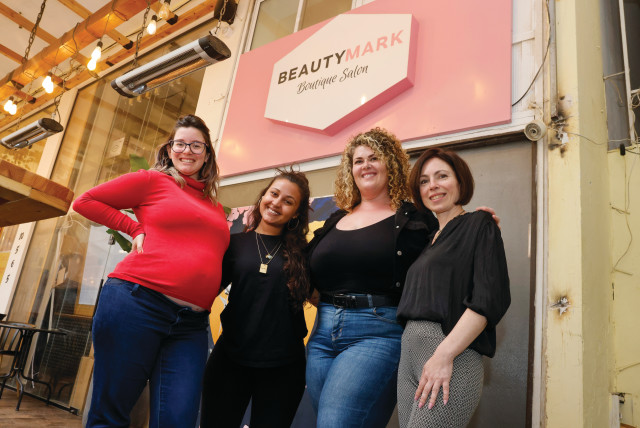  THE WOMEN of BeautyMark (from L): Owner Daniella Mark; massage therapist Ma’ayan Shalom; hair stylist Debra Neal; and nail technician Olga Amos. (credit: MARC ISRAEL SELLEM)