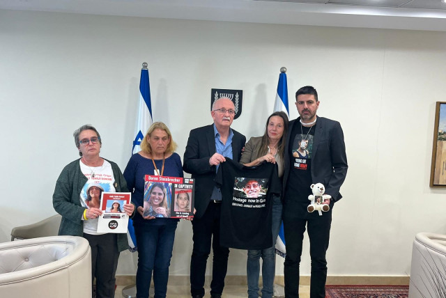  Udo Bullmann (center) speaks with families of Israeli hostages (credit: KNESSET SPOKESPERSON'S OFFICE)