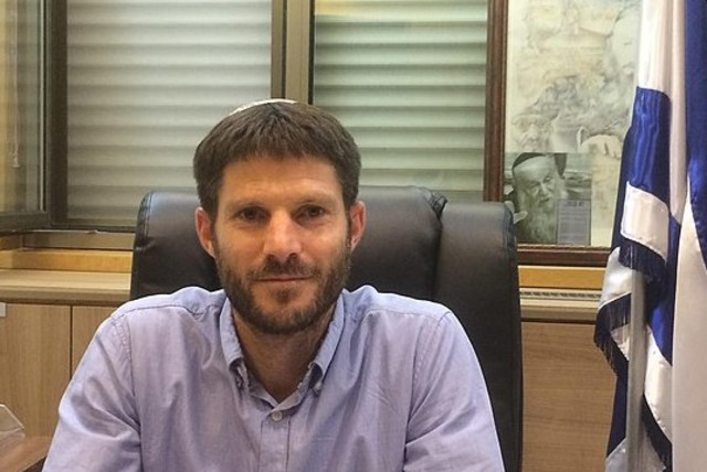  Smotrich sitting behind his desk (credit: WIKIMEDIA)