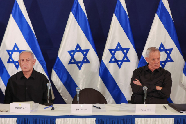  Israeli prime minister Benjamin Netanyahu and Cabinet minister Benny Gantz during a press conference in the Kirya military base in Tel Aviv , Israel , 28 October 2023.  (credit: ABIR SULTAN/POOL)